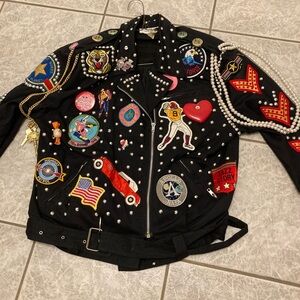 Woman size M jacket with many symbols
